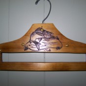 Hanger after cutting out a rectangular slot and design burned in