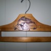 Hanger after cutting out a rectangular slot and design burned in