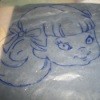 Tracing a pattern using recycled liners from cereal boxes.