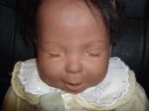 Closeup of doll's eyes closed