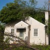 Fallen tree on house