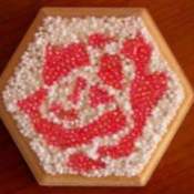 view of box top with white beads added to complete design
