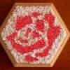 view of box top with white beads added to complete design