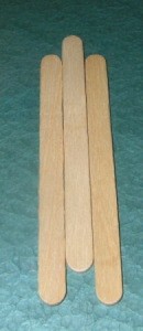 first three sticks with middle one higher than adjacent two