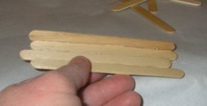 first perpendicular stick glued onto base sticks