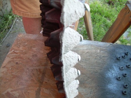 Egg Carton holding screws for painting
