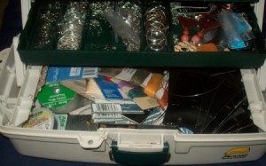 Tackle box filled with jewelery supplies