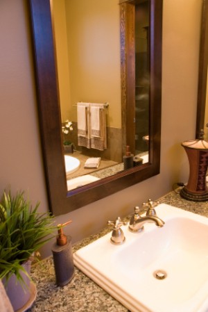 A mirror in a nice bathroom.