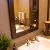 A mirror in a nice bathroom.