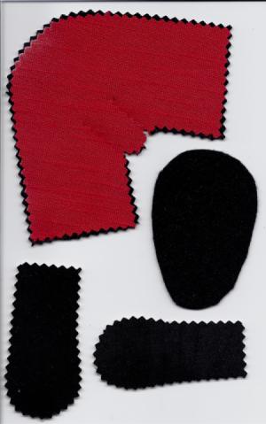 four pieces of bootie pattern cut from felt in red and black