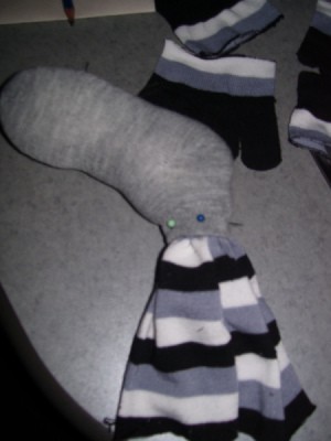 Photo of anklet and sock being stuffed to make creatures.