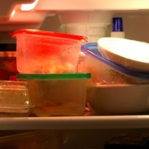 Photo of the inside of a messy refrigerator.