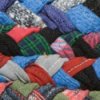 Closeup of a section of a braided rag rug.