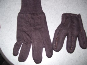 Pair of gloves with one reengineered for antlers.