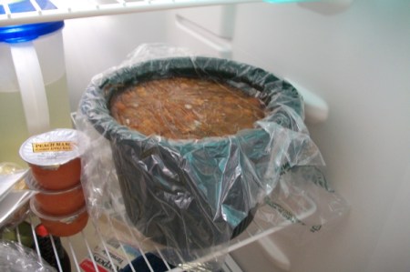 Soup with plastic over top
