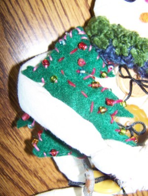 Closeup detail of a Snowman Plant Stake 