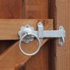 Metal latch on a wooden gate.
