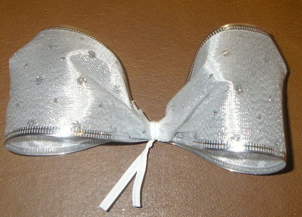 Angel wings with silver ribbon