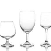 Row of Wine Glasses on White Background