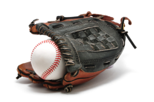 A baseball glove with a baseball.