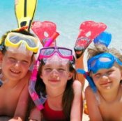 Three kids in snorkel gear.
