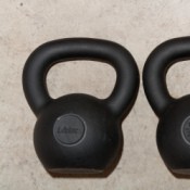 Using Kettlebells, Saving Money on Kettlebells2 Kettlebells Laying on Concrete