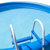 A blue above ground swimming pool.