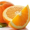 Whole, half, and orange slice against white background.