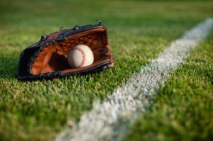 Baseball Glove with Ball in Glove on Grass