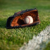 Baseball Glove with Ball in Glove on Grass