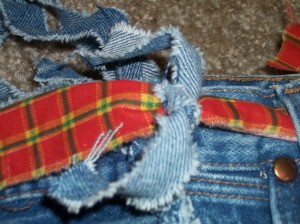 Adding Halloween fabric belt to Jean bag.