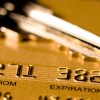 A credit card with a key on top of it.