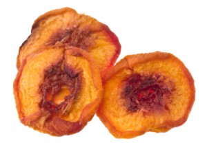 Three dried peach slices.
