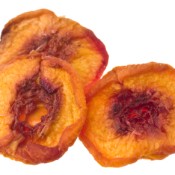 Three dried peach slices.