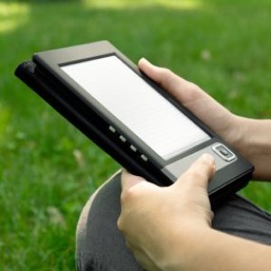 Buying an eBook Reader, Someone using an eBook reader.