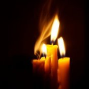 Three flaming candles.