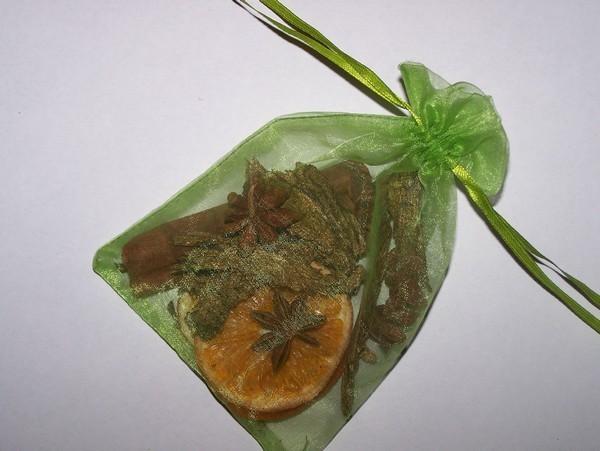 Green mesh bag filled with dried potpourri