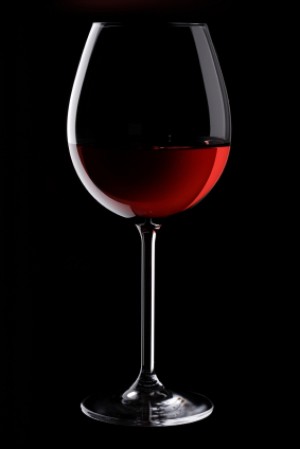 Red Wine in Crystal Glass on Black