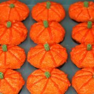 Cupcakes decorated as pumpkins.