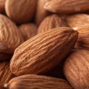 Up close photo of whole almonds.