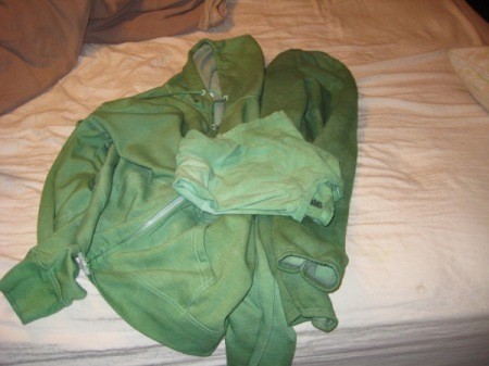 Clothes Laid Out on bed After Being Dyed Green