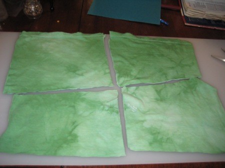 Dyed Green Fabric Cut in Quarters