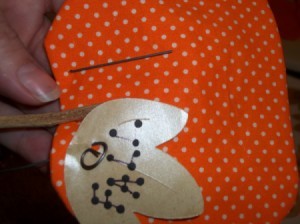 Attaching a leaf using craft wire.