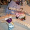 Padded silk hangers with bags of different colored satin ribbons.