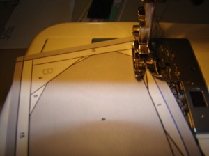 Sewing piece #2 onto piece #1 along printed stitching line.
