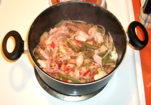 Pink stir fry in  a pot.
