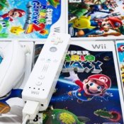 Photo of Wii games and Wii controller.