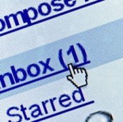 Photo of a person clicking on their inbox.
