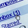 Photo of a person clicking on their inbox.