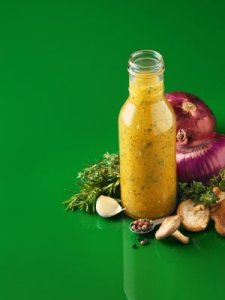 A bottle of homemade salad dressing.